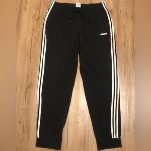 Medium size classic 3 stripes adidas athletic pants.
